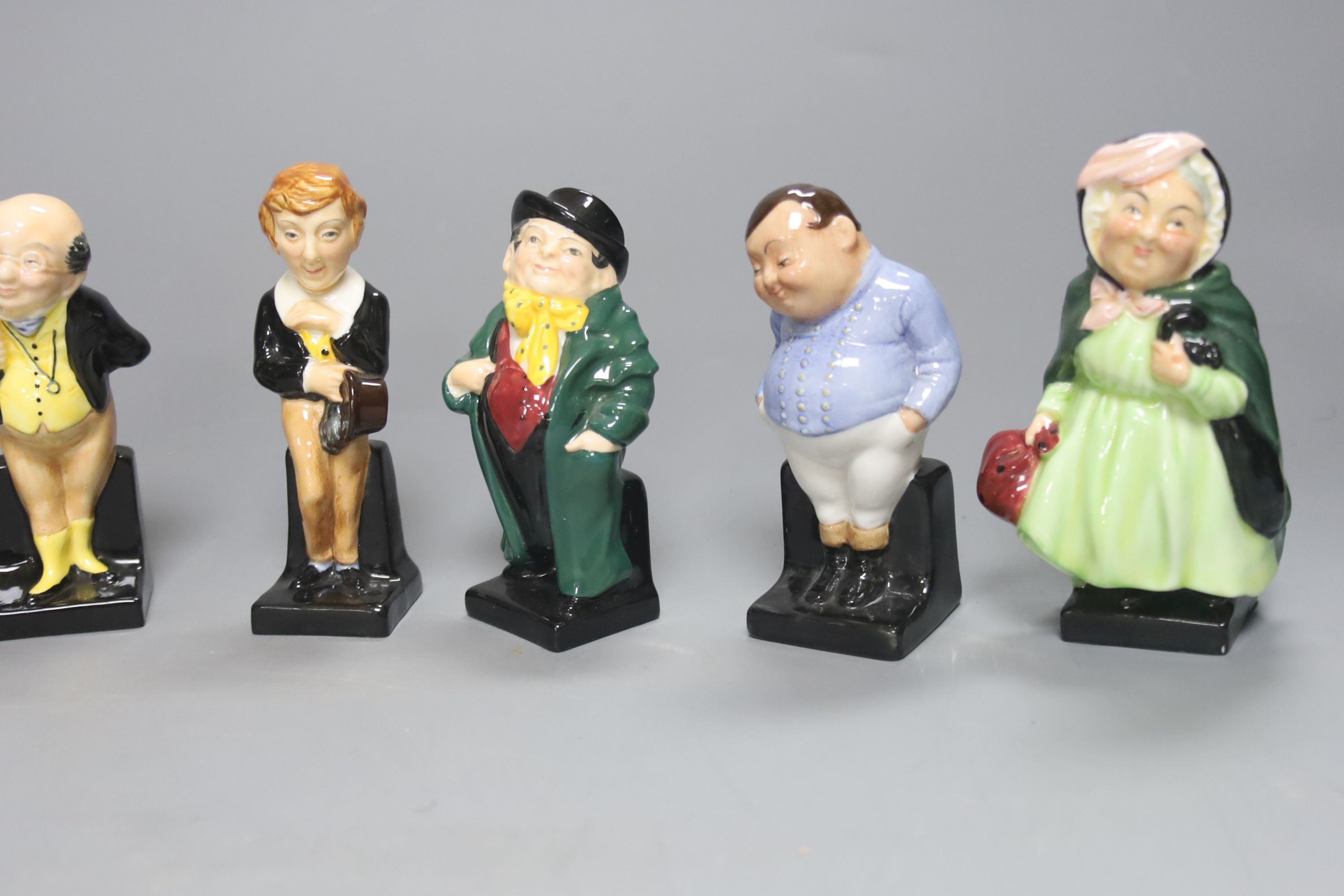 Seven Royal Doulton figures: Sam Weller, Sairey Gamp, David Copperfield, Pickwick, Fat Boy, Tony Weller and Uria Heep